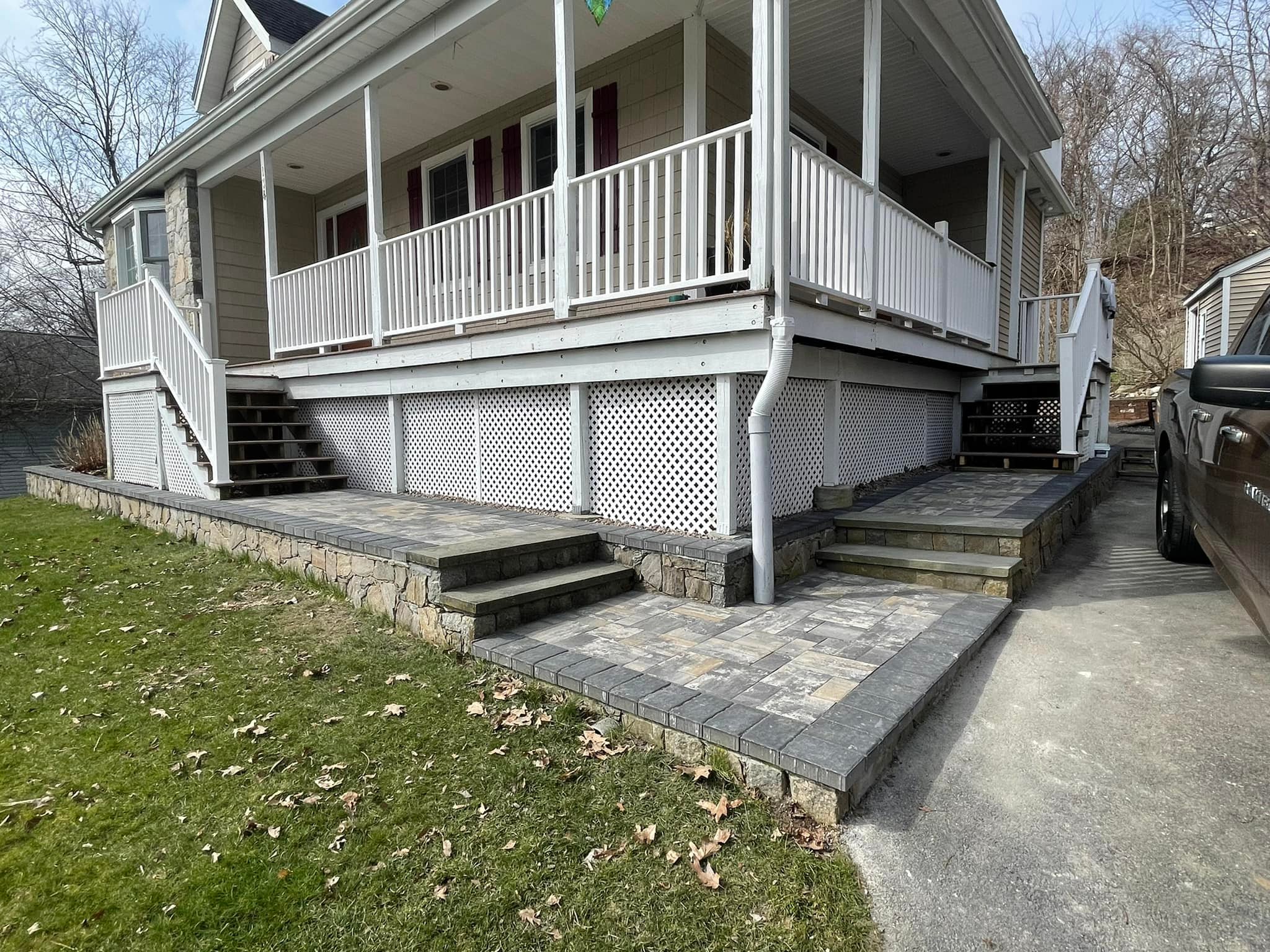 Paver driveway apron and walkway at the front of a home